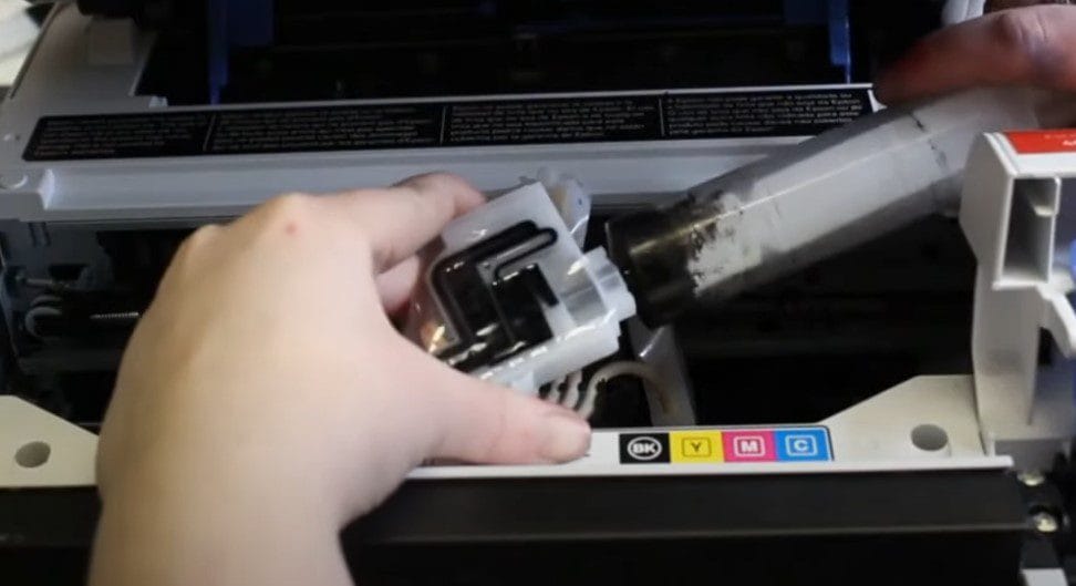 Priming printer damper with syringe